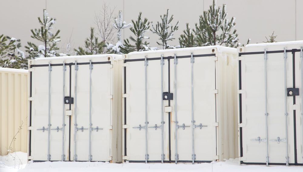 beige storage units or containers outside in winter