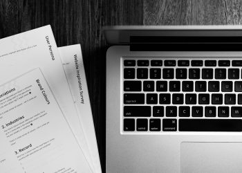 Laptop and desk setup representing resume preparation and professional skills